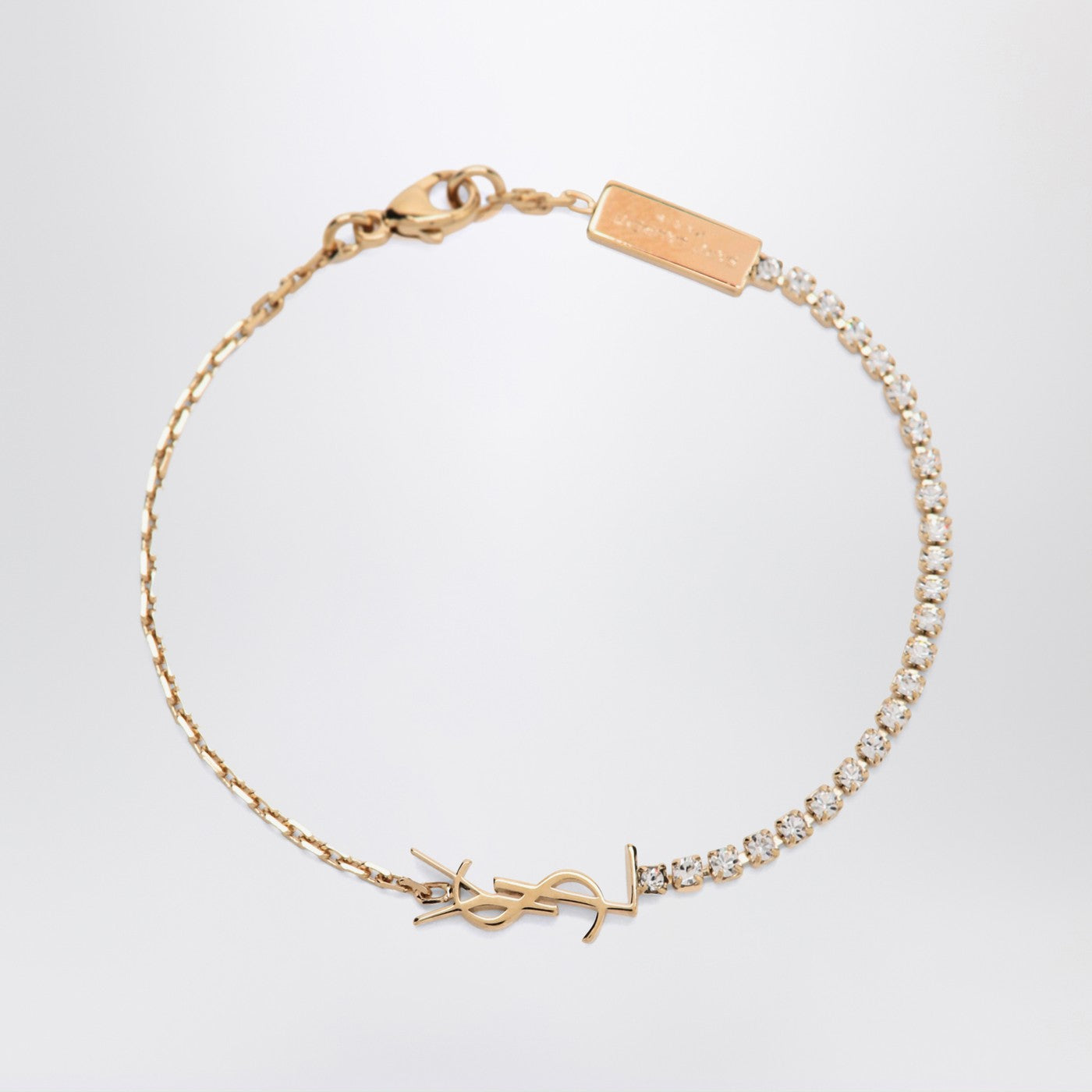 Saint Laurent Cassandre charm bracelet in gold-tone metal | TheDoubleF