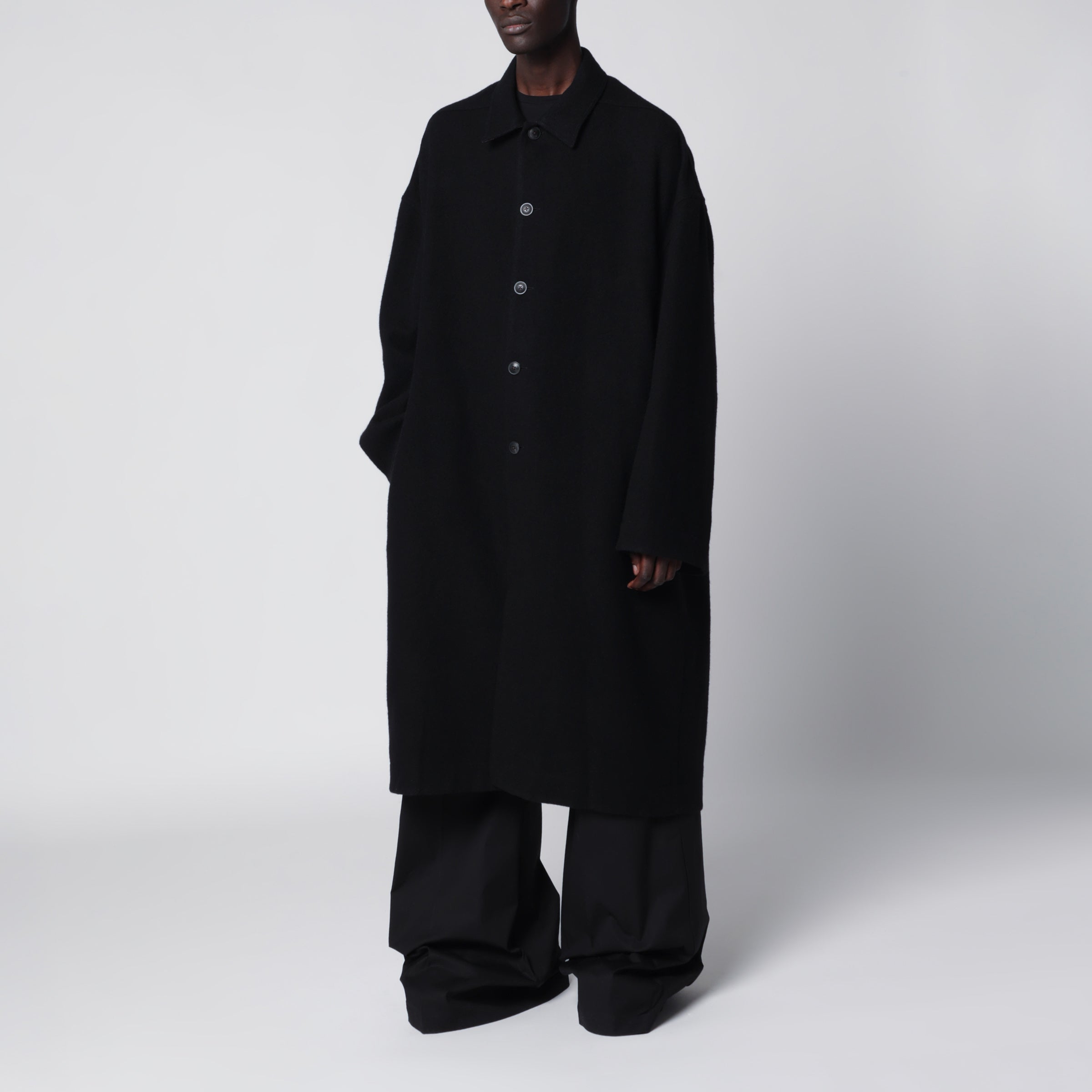 Rick Owens Long single-breasted virgin wool coat in black | TheDoubleF