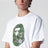 T-shirt bianca con stampa mimetica