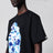Schwarzes T-Shirt mit blau/hellblauem Camouflage-Print