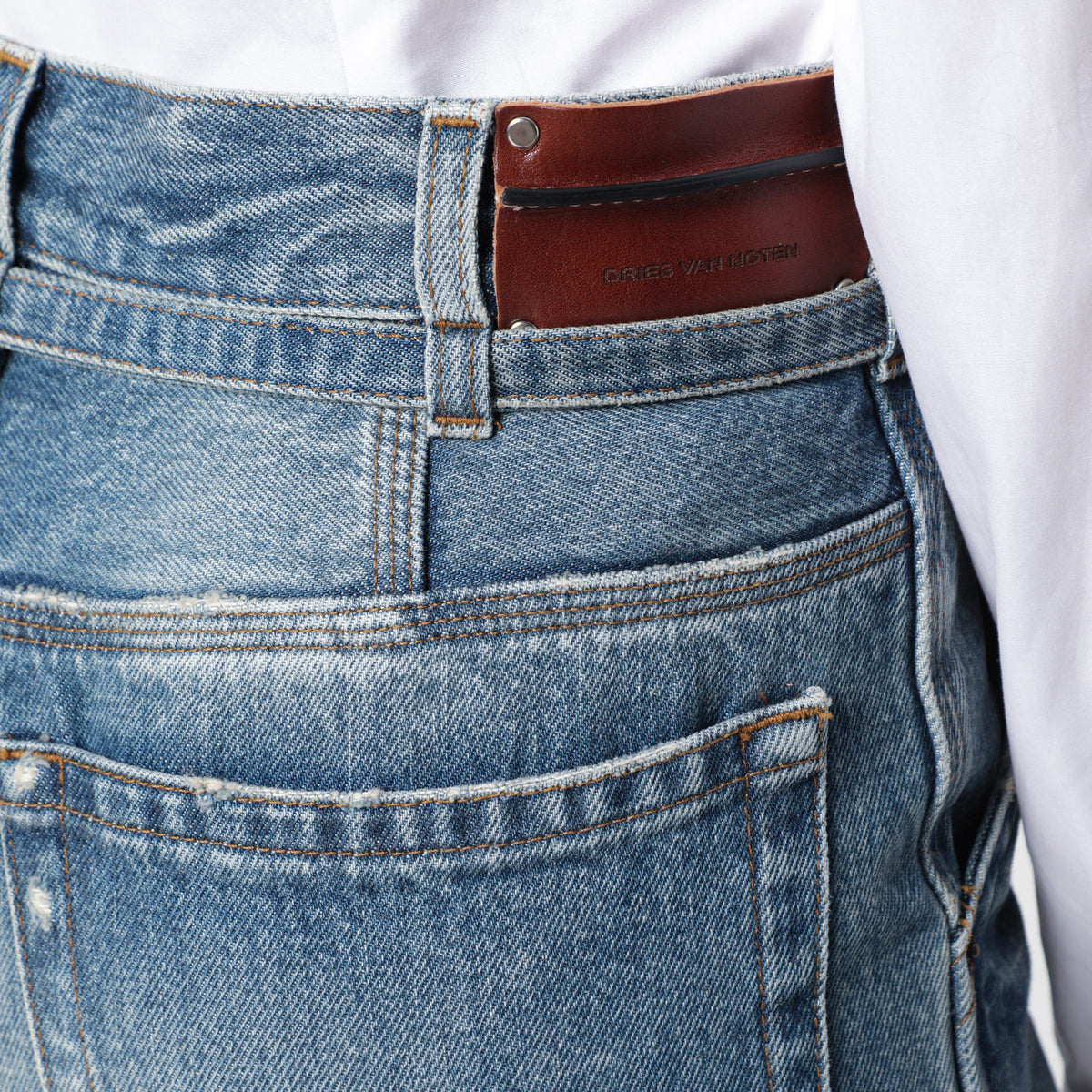 Blue washed-effect jeans with belt