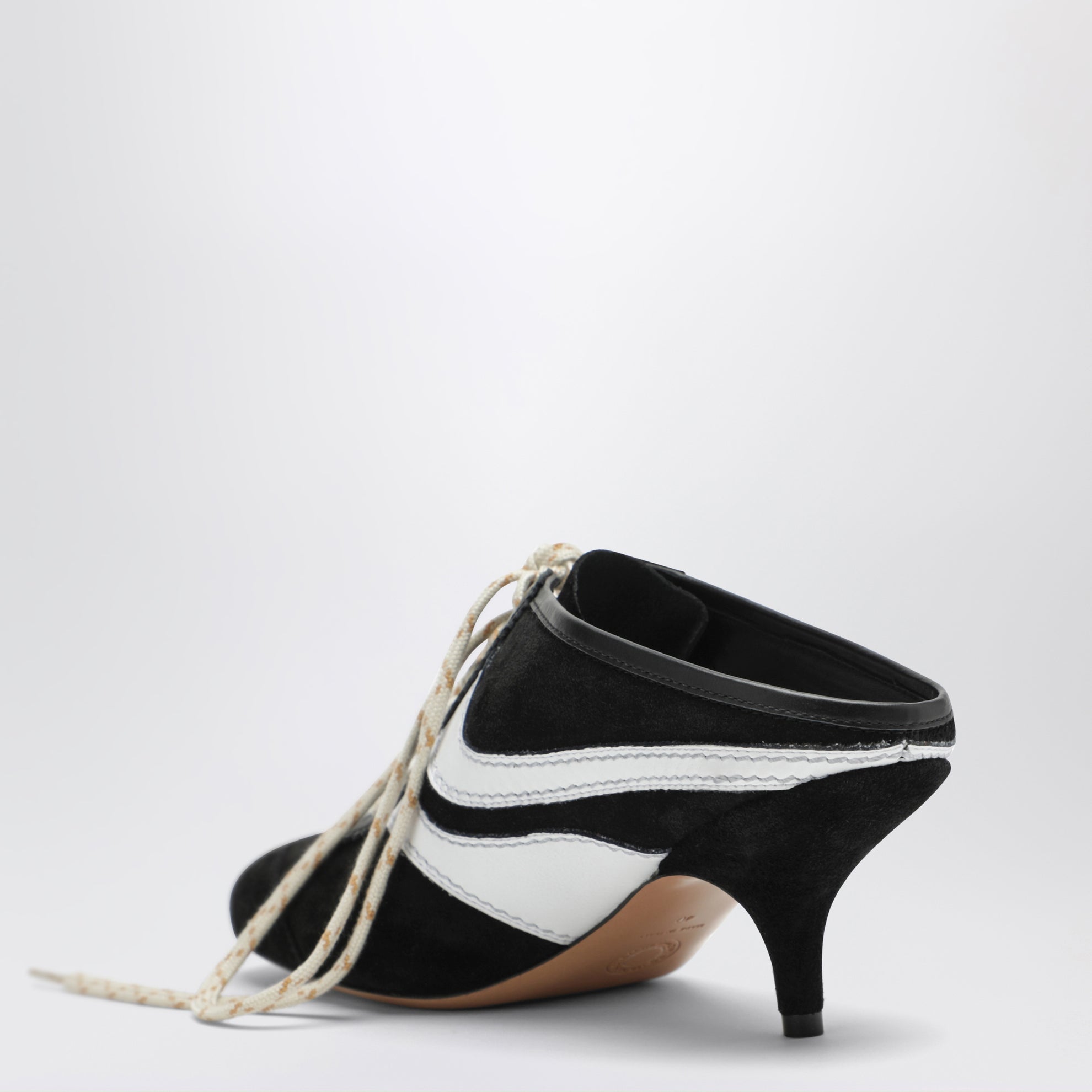 Mules 65 in suede e pelle neri e bianchi