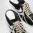 Mules 65 in suede e pelle neri e bianchi