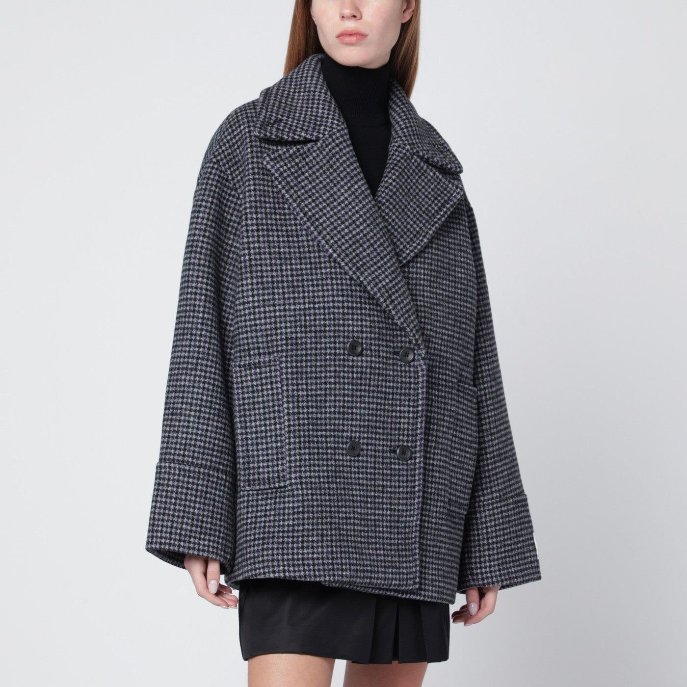 Grey double-breasted houndstooth coat