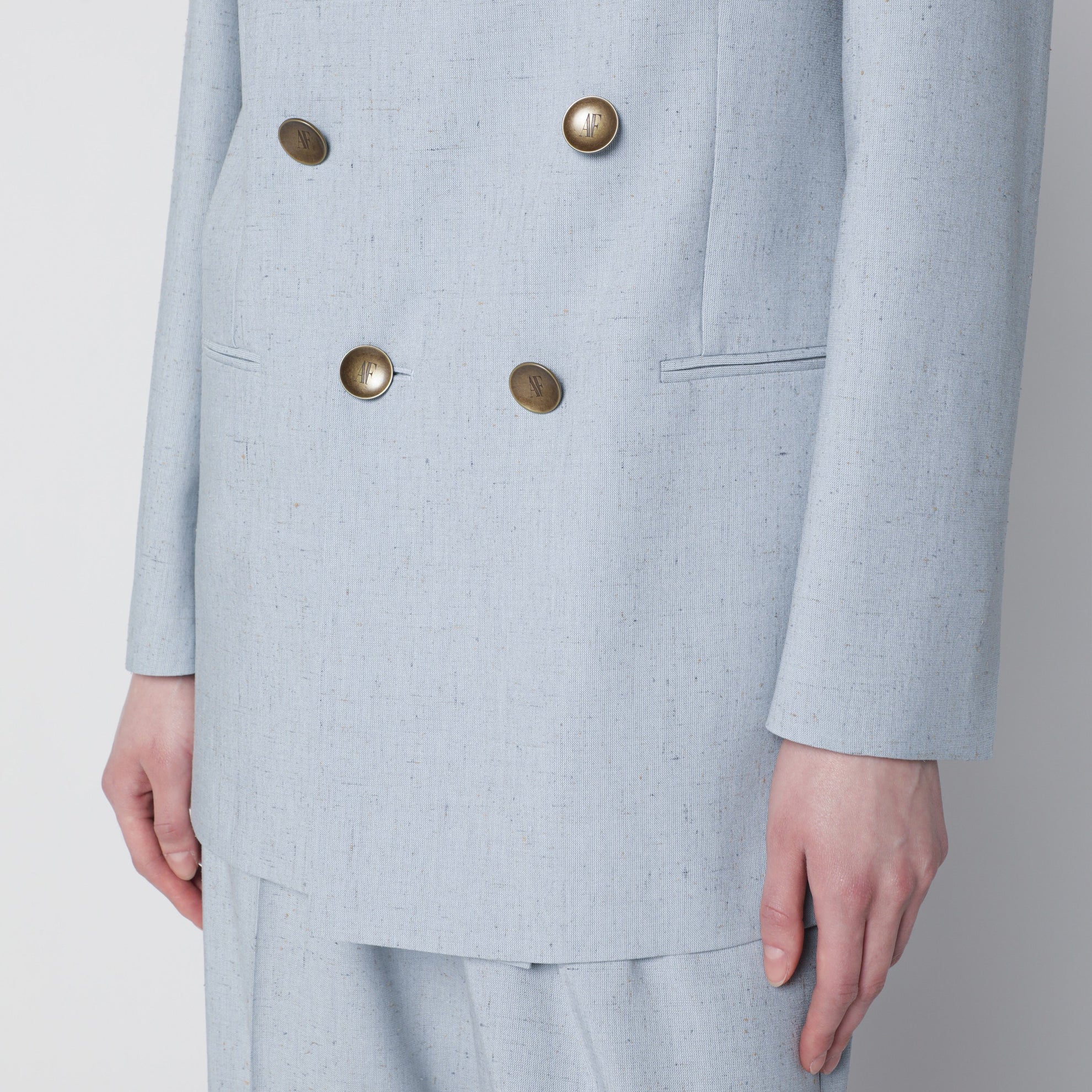 Light blue double-breasted tweed jacket