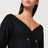 Veste noire en laine à col en V