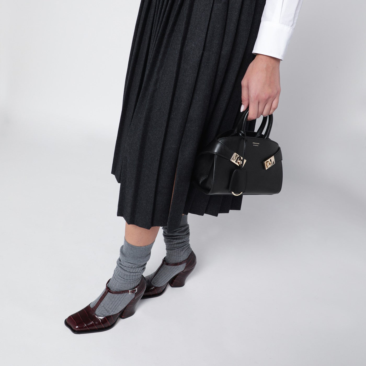 Mini Hug black leather handbag