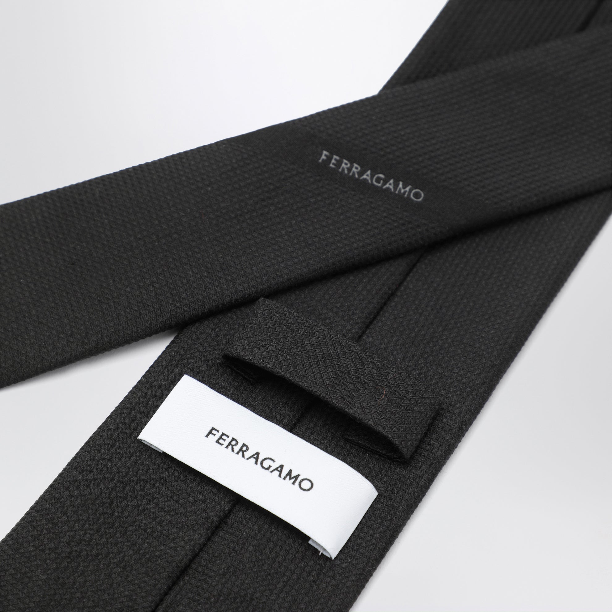 Cravatta jacquard nera in seta
