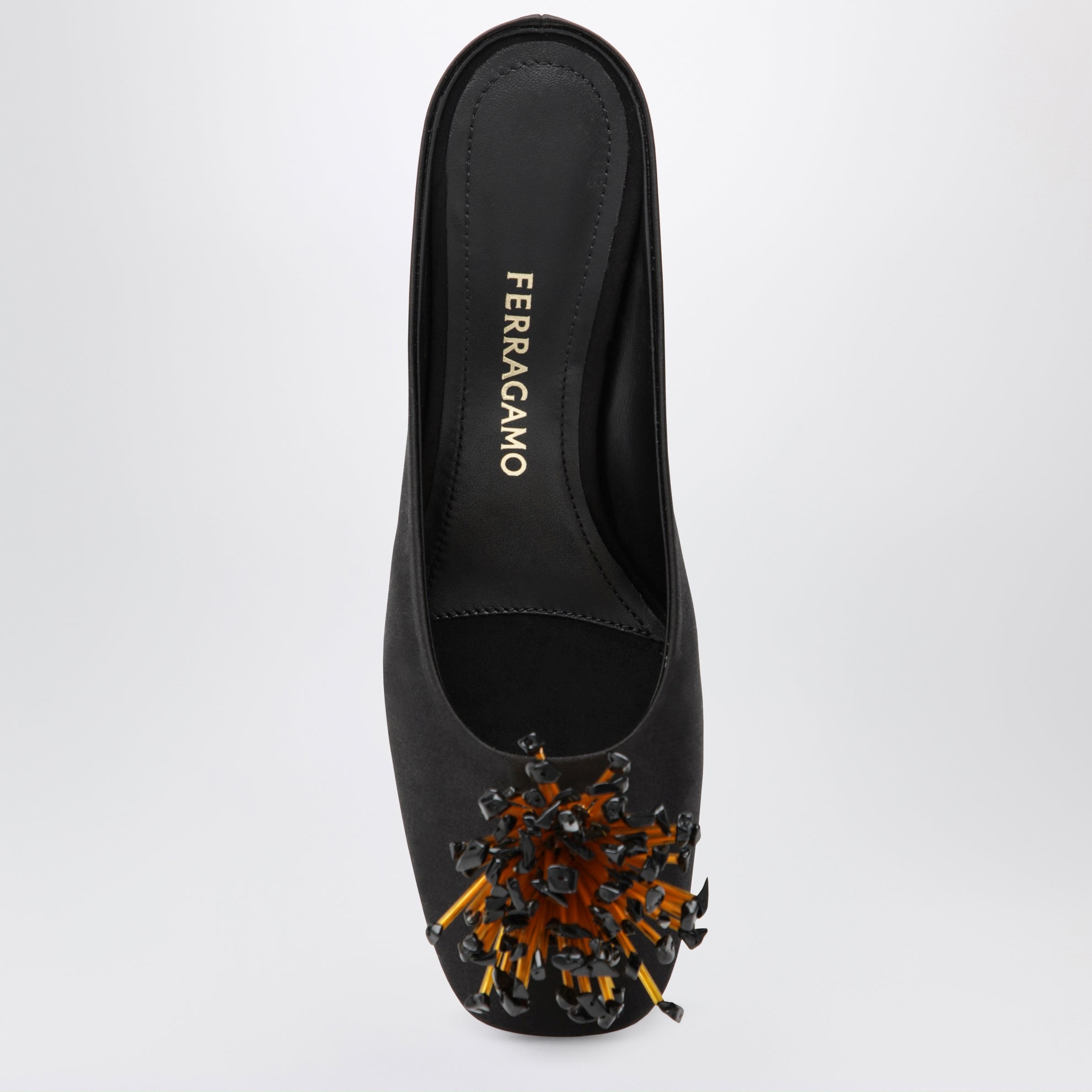 Mule nere con tacco scultura e fiore in cristalli