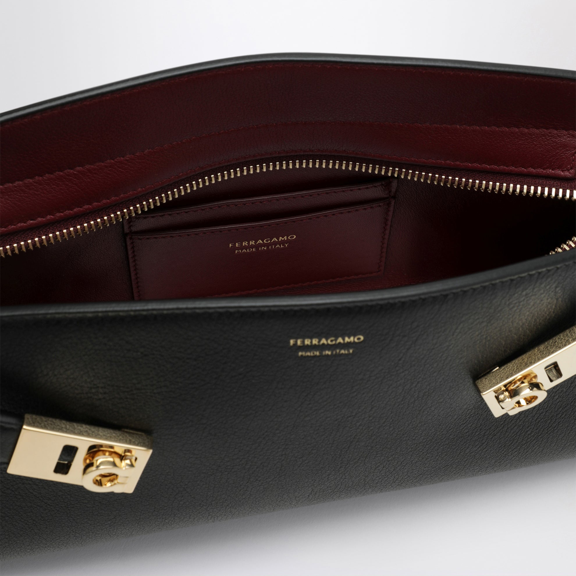 Hug East-West black/burgundy calfskin shoulder bag