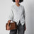 Braune Postina Zashmere S Tasche aus Veloursleder