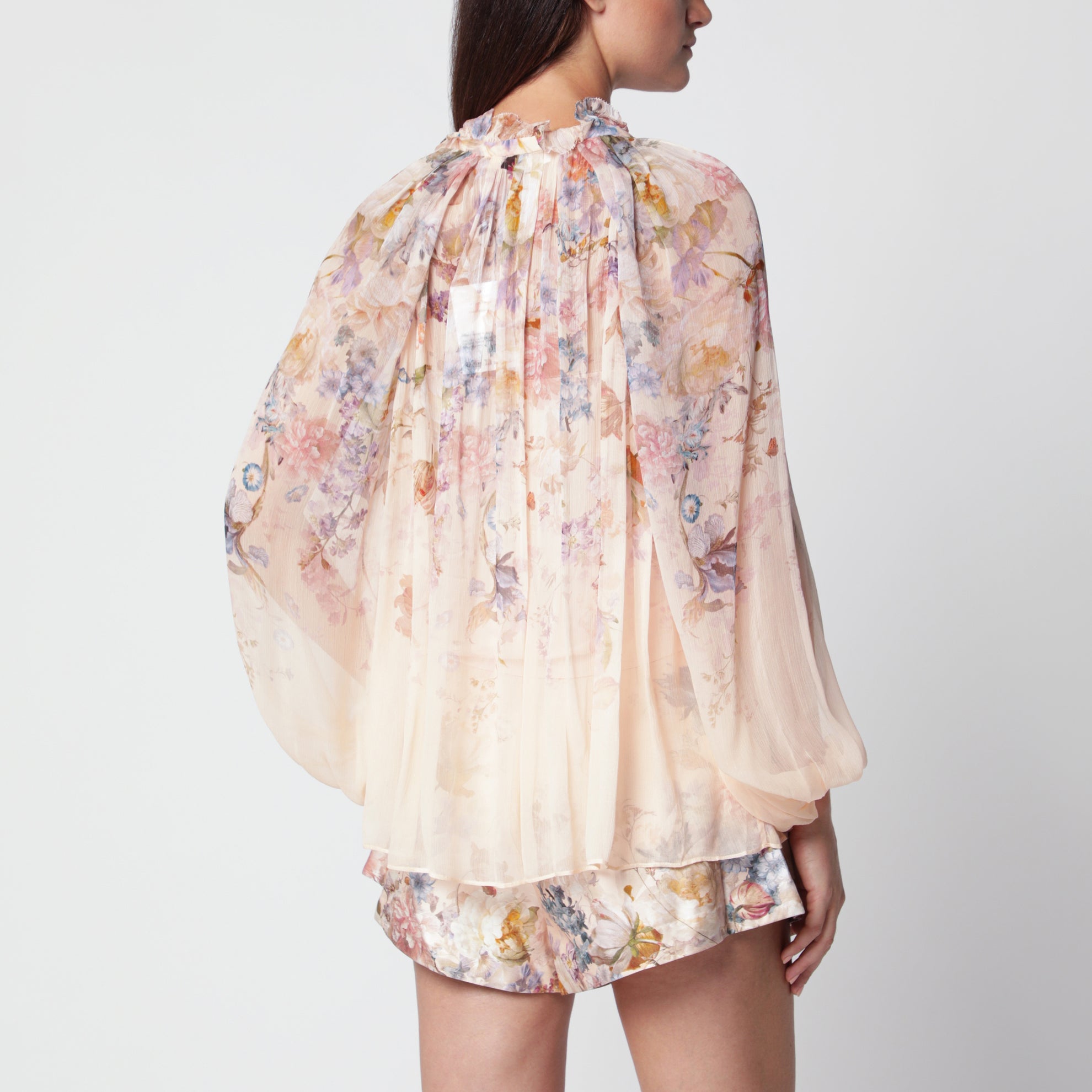 Blusa Valiant color pesca con motivo floreale