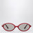Miu Regard oval sunglasses in burgundy