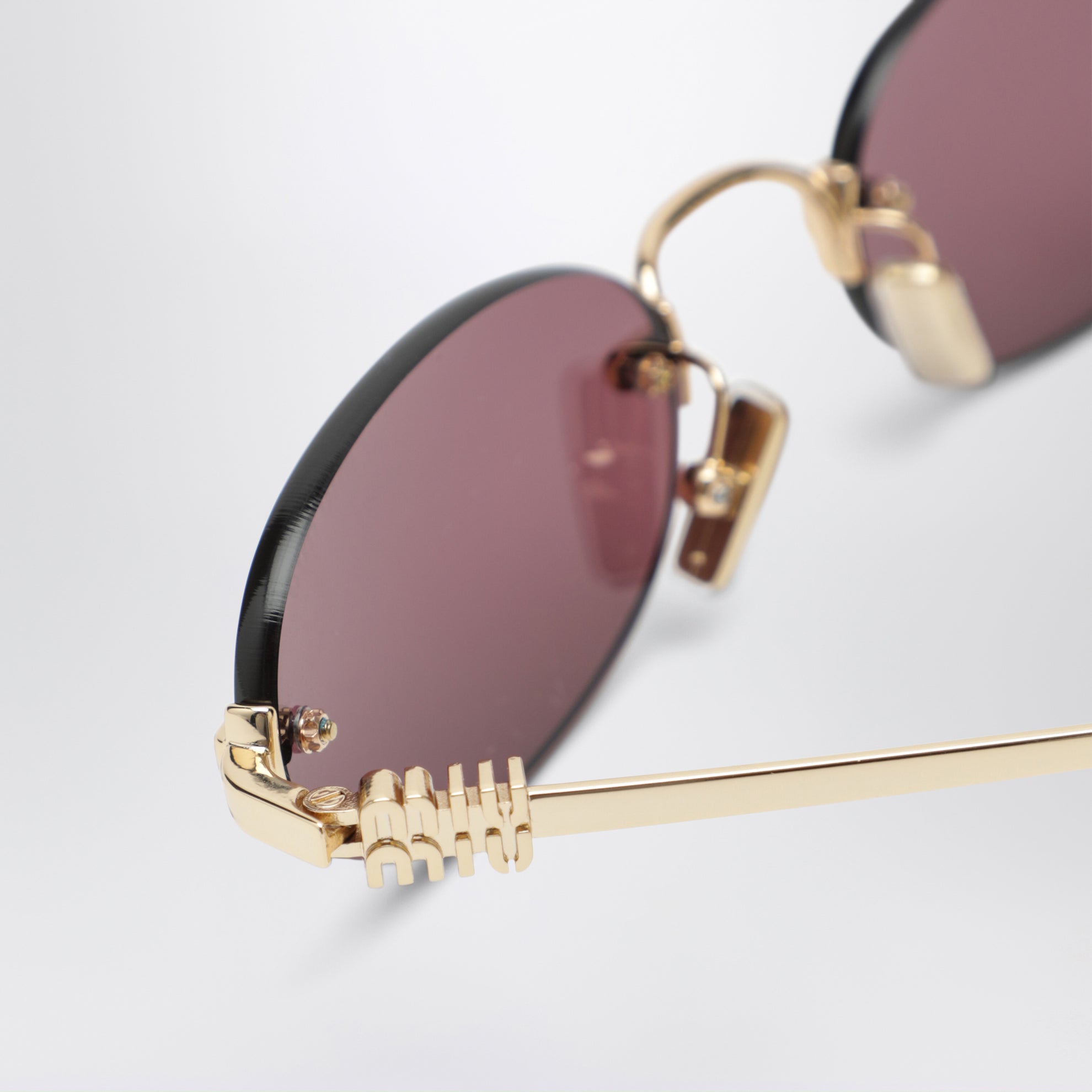 Lunettes de soleil Miu Miu Logo or/jaune