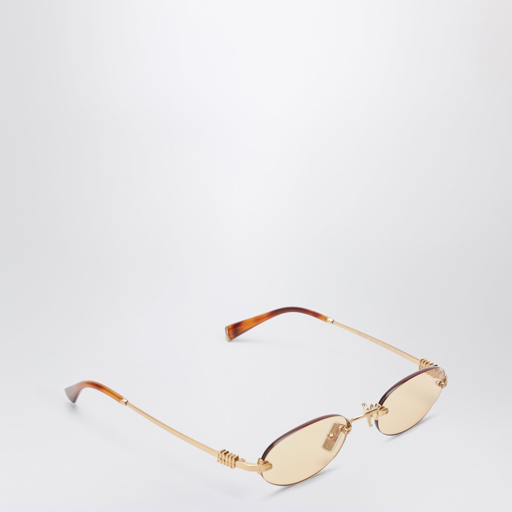 Miu Miu Logo sunglasses in gold/pink