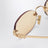 Miu Miu Logo sunglasses in gold/pink