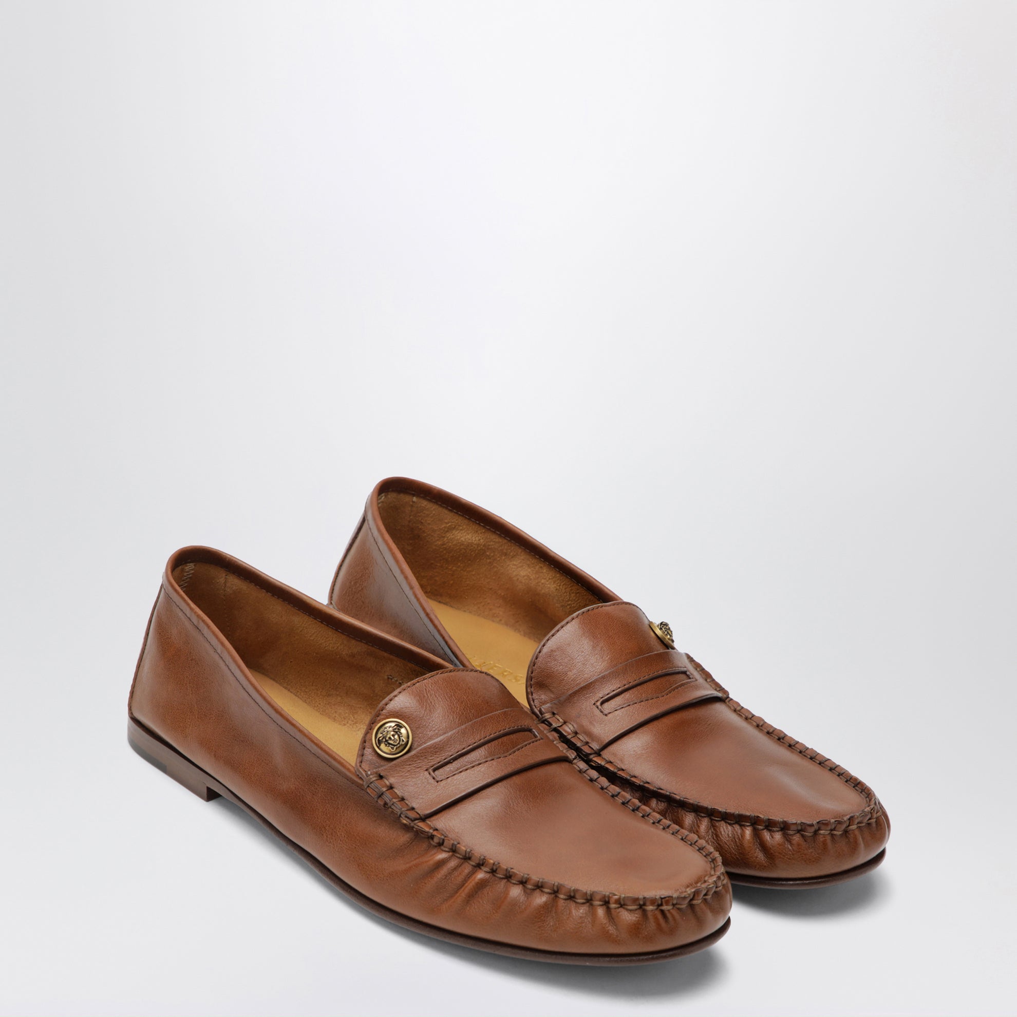 Brown Guanto loafers in calf leather
