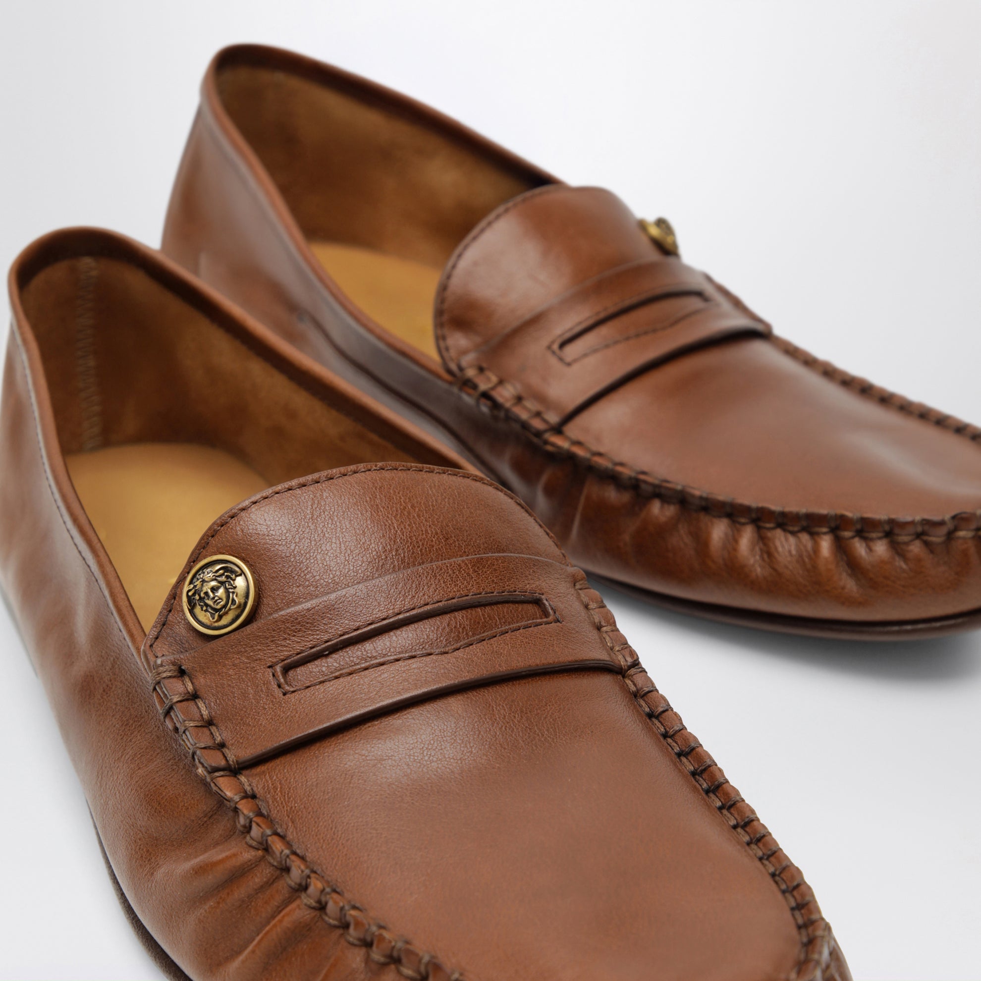Brown Guanto loafers in calf leather