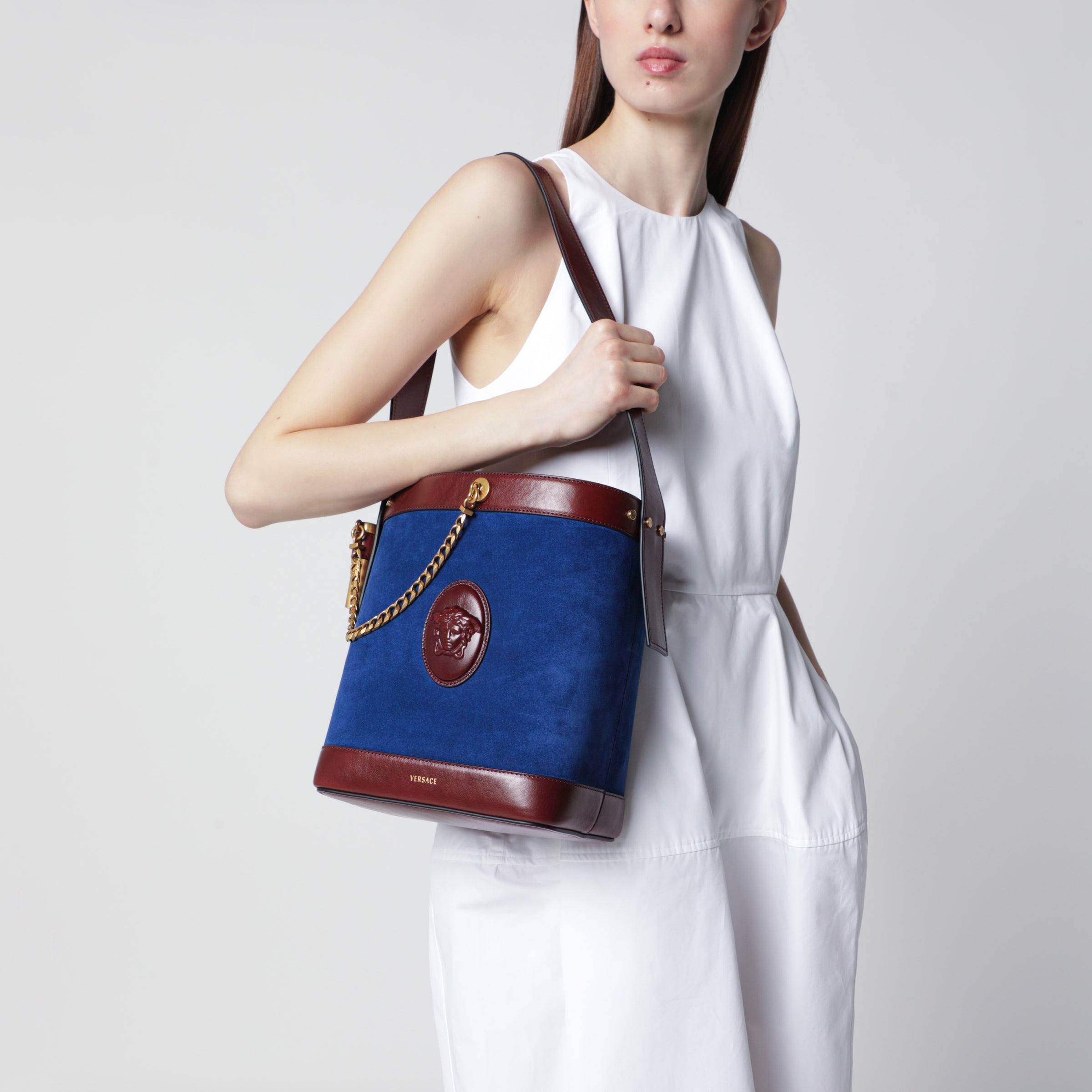 Versace Small Pivot bucket bag in suede and leather blue | TheDoubleF