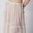Écru semi-sheer silk skirt