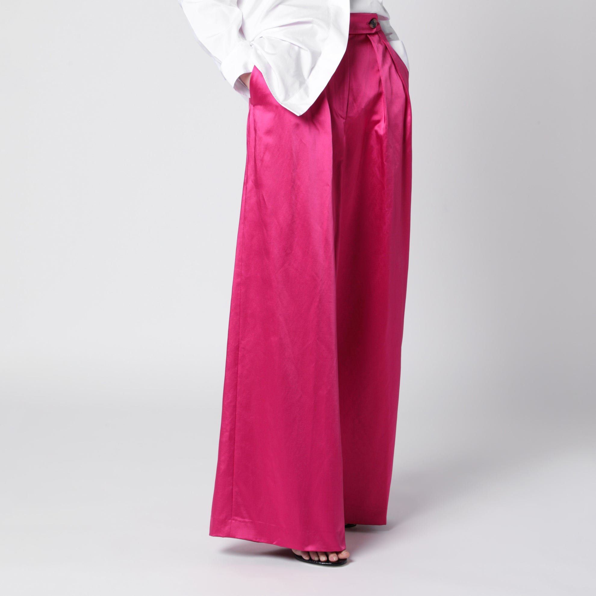 Wide pleated fuchsia satin trousers