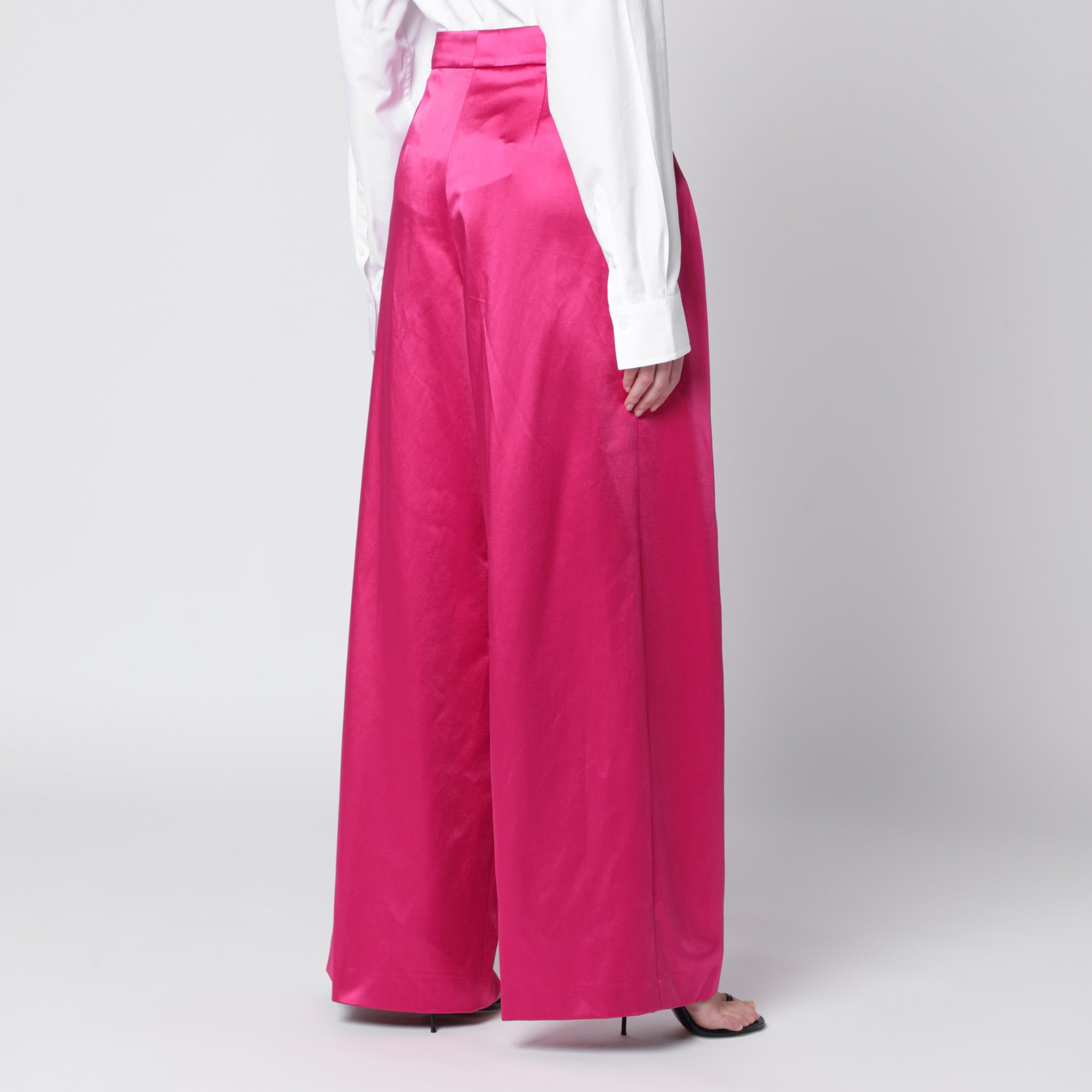 Wide pleated fuchsia satin trousers