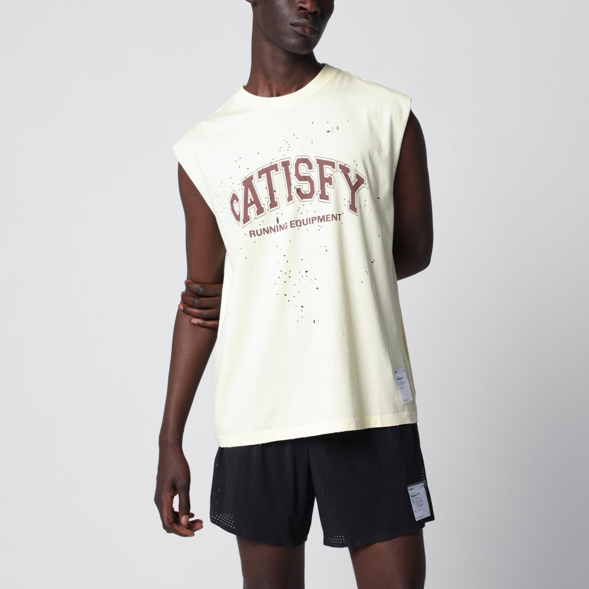 Light yellow MothTech tank top with perforations