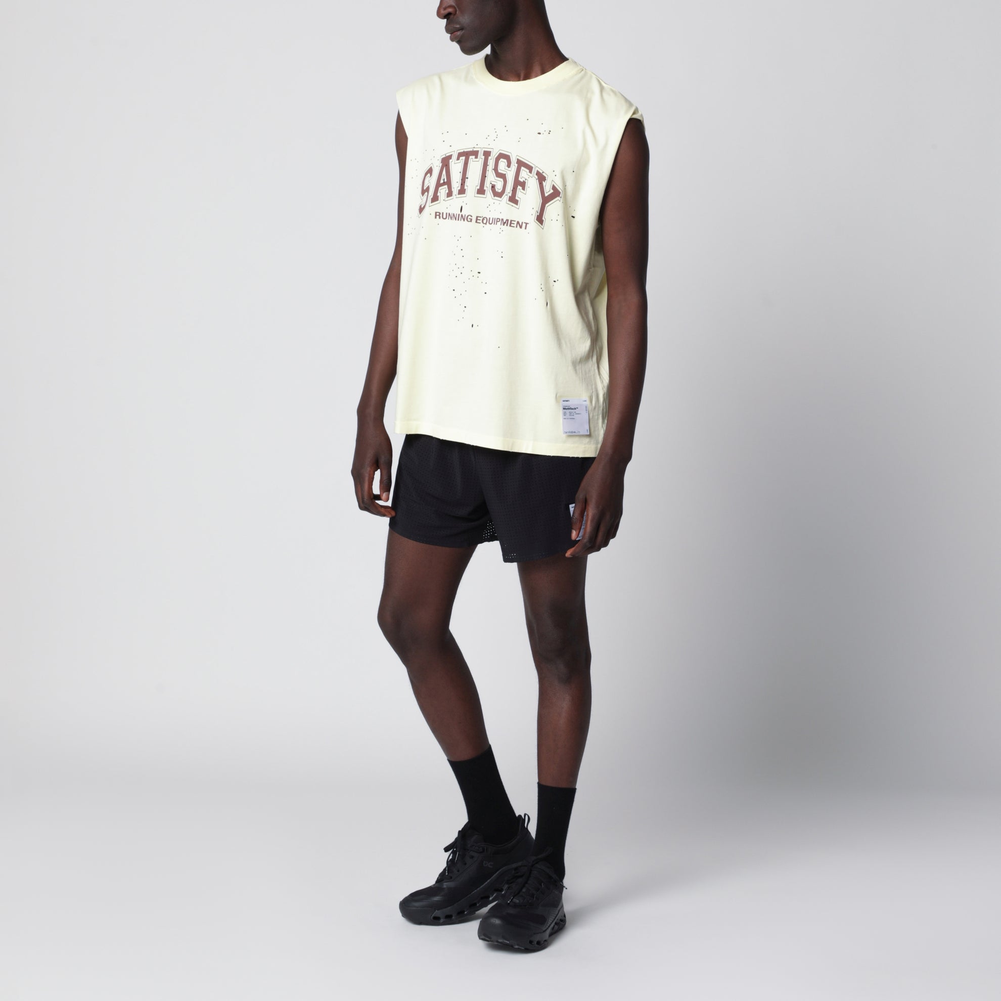 Light yellow MothTech tank top with perforations