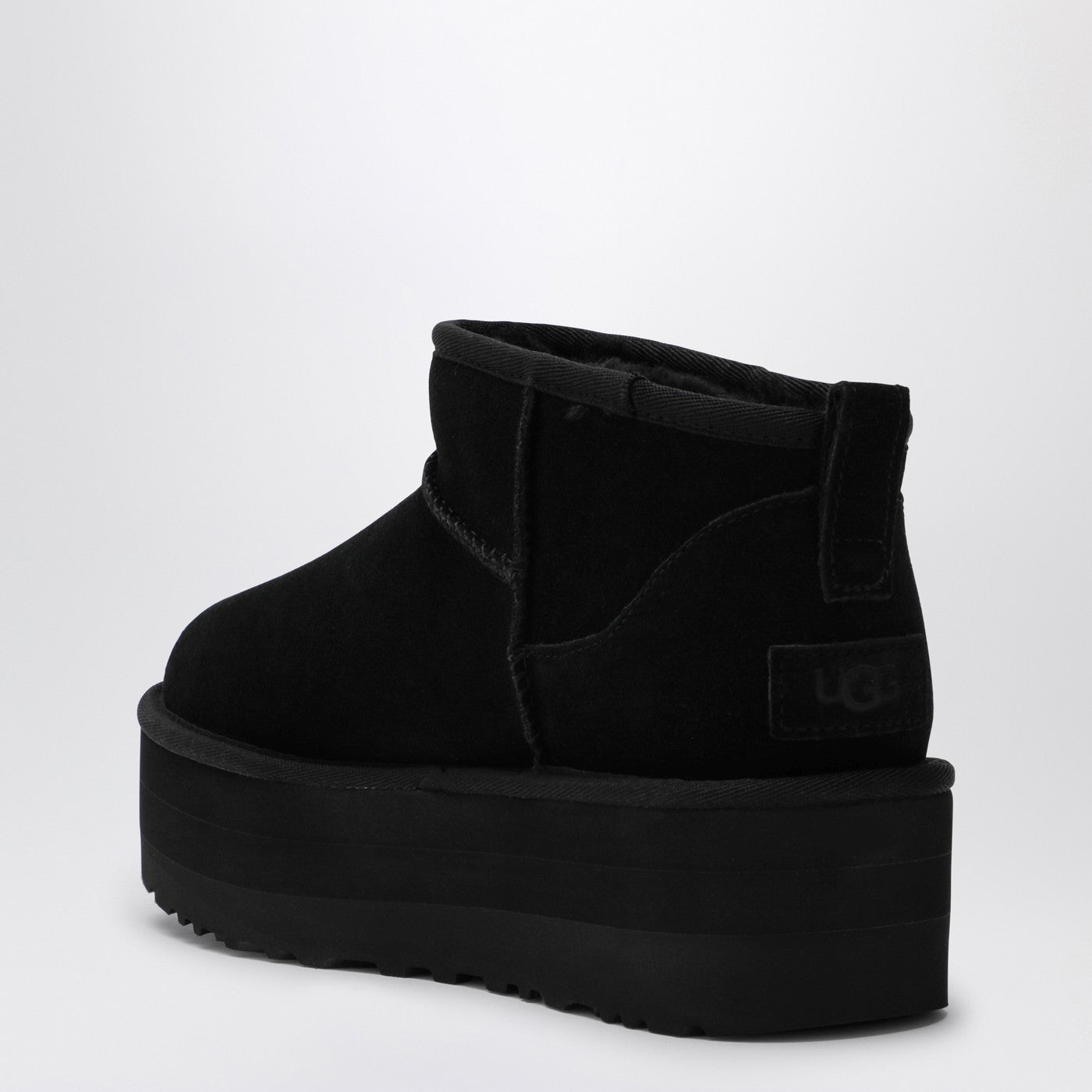 Classic Ultra Mini black boot with platform