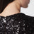 Abito mini con paillettes e maxi fiore marrone Molé
