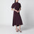 Drapiertes Midikleid in schwarz ribes