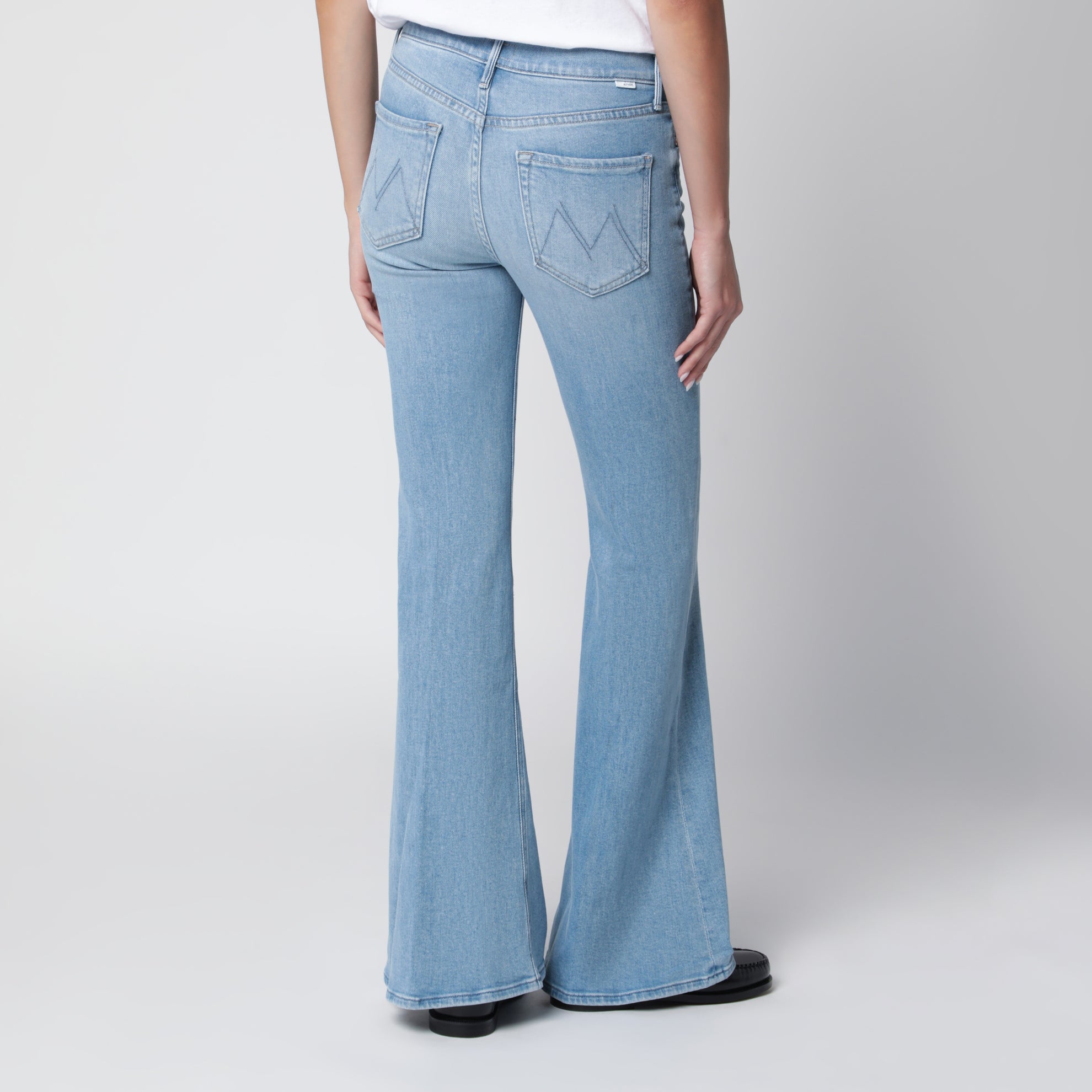 The Doozy flared trousers in light blue denim