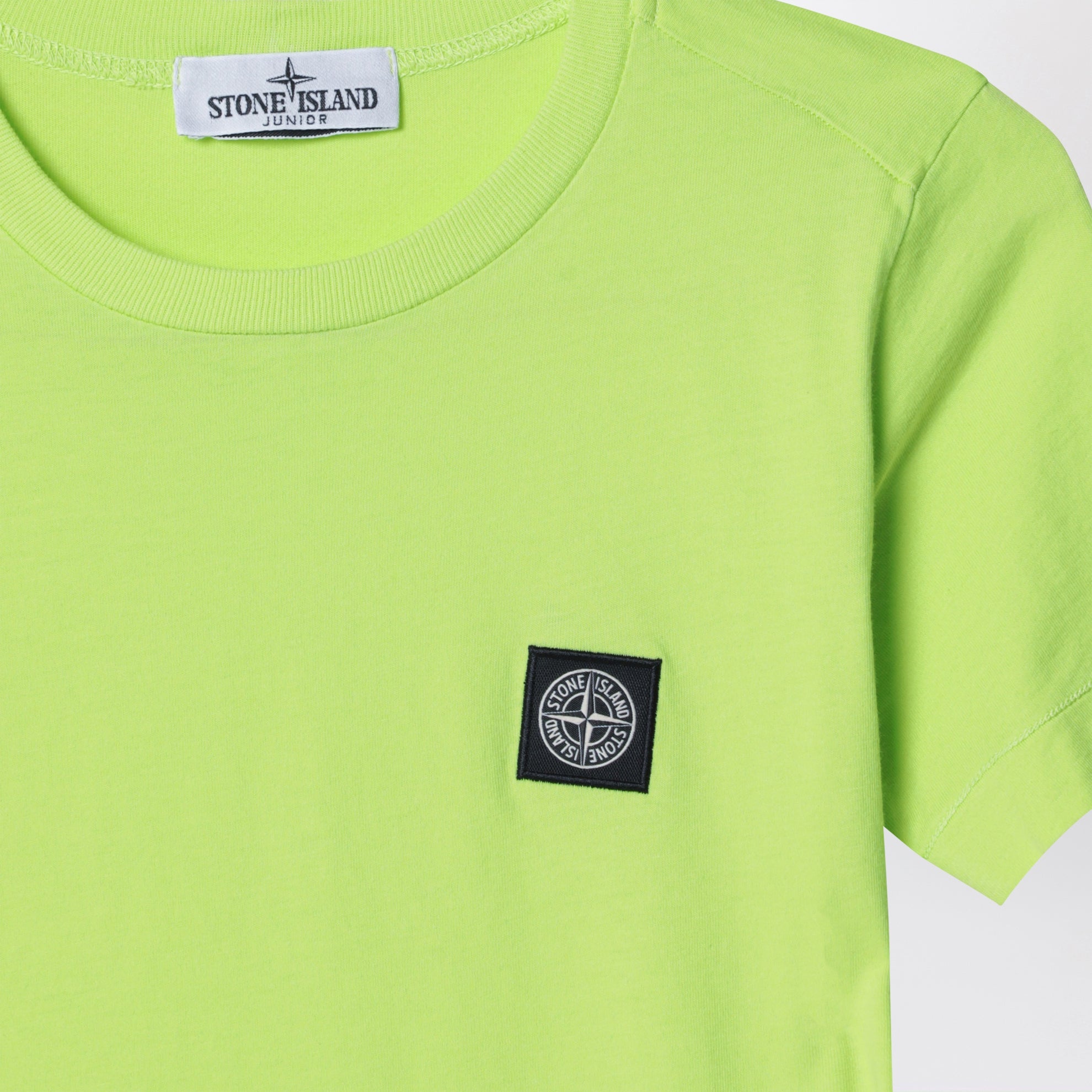 Lime yellow T-shirt with Compass logo patch