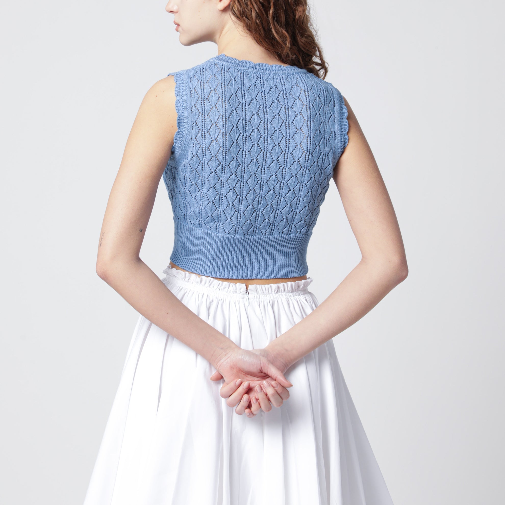 Top blu chiaro in crochet con logo Orb