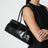 Borsa a mano Bonnie medium in pelle di vitello nera