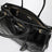 Large Bonnie top-handle bag in black calf leather