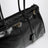Large Bonnie top-handle bag in black calf leather