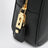 Black Saffiano leather top-handle bag