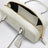 Shoulder bag in white leather