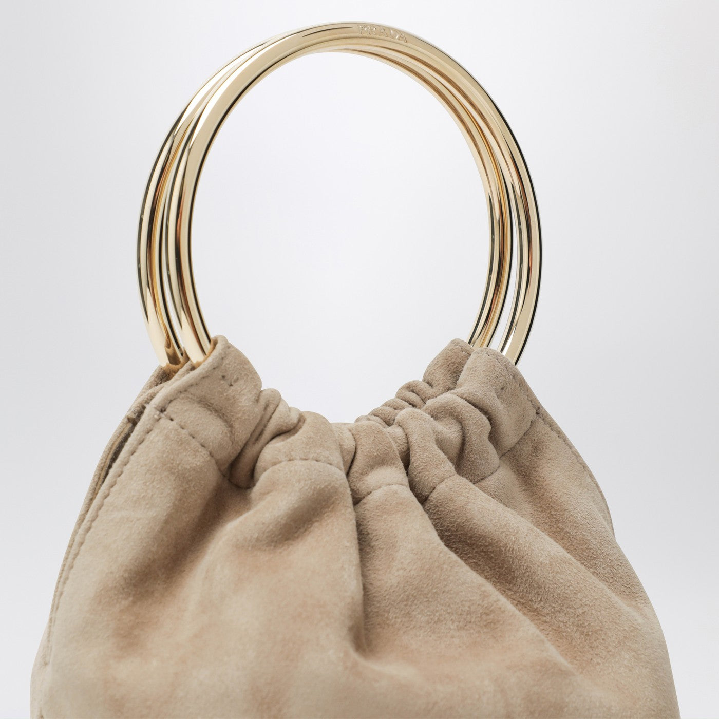 Mini bucket bag in desert suede