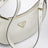 Borsa a spalla Prada Arqué medium in pelle bianca