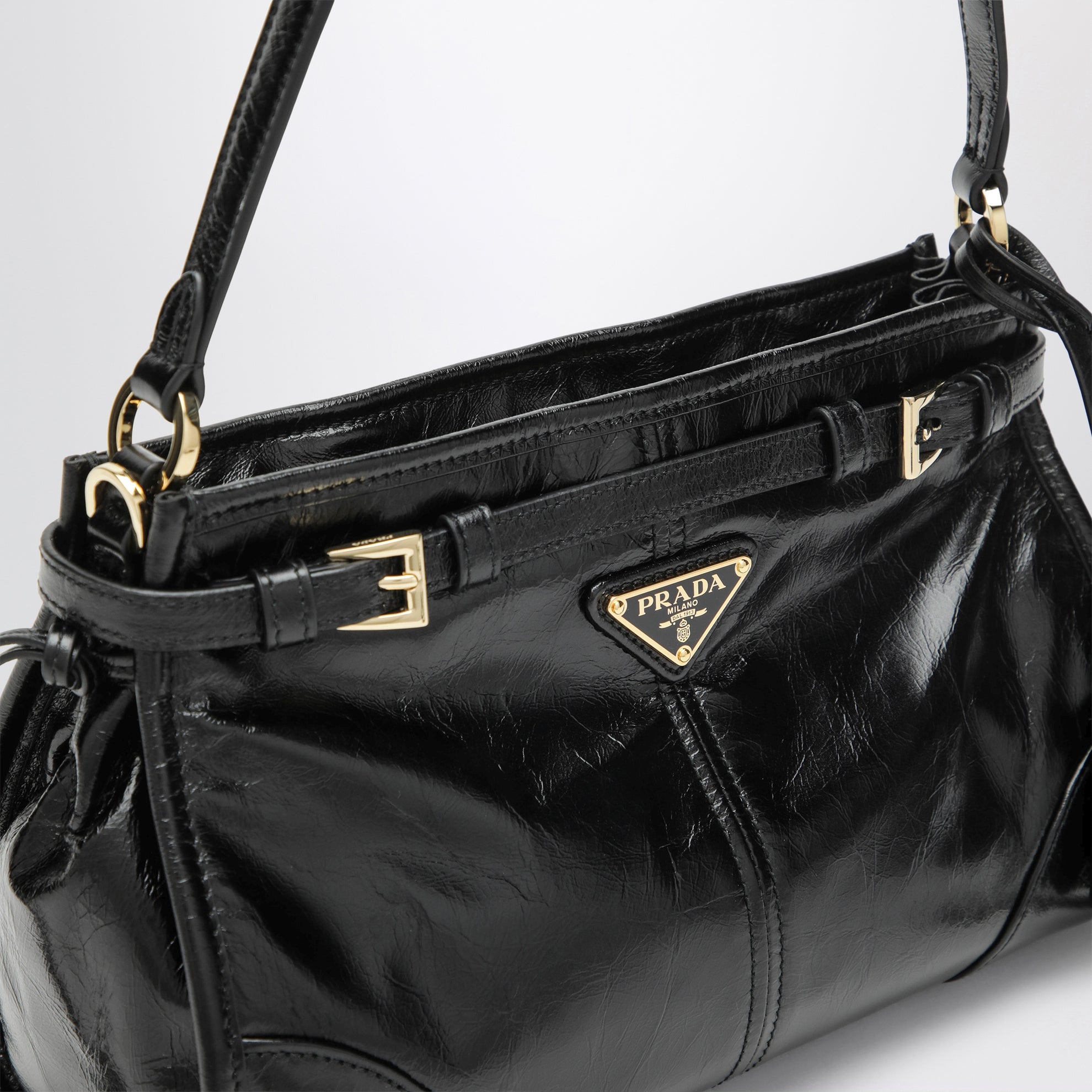 Small Bonnie top-handle bag in black calf leather