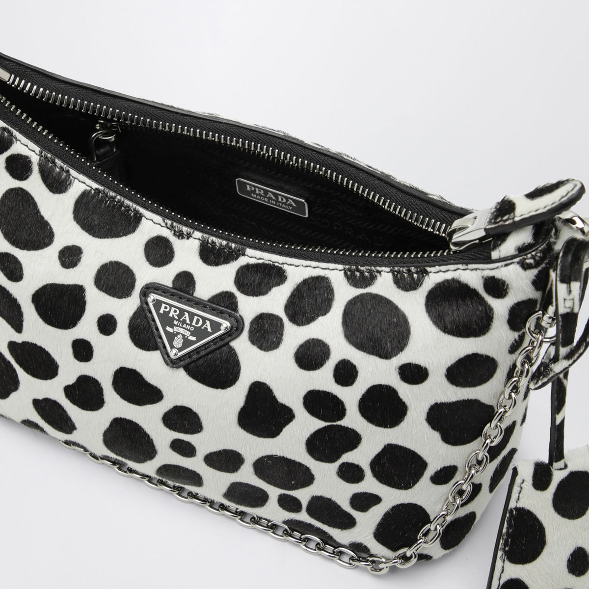 Mini borsa bianca e nera in cavallino stampato