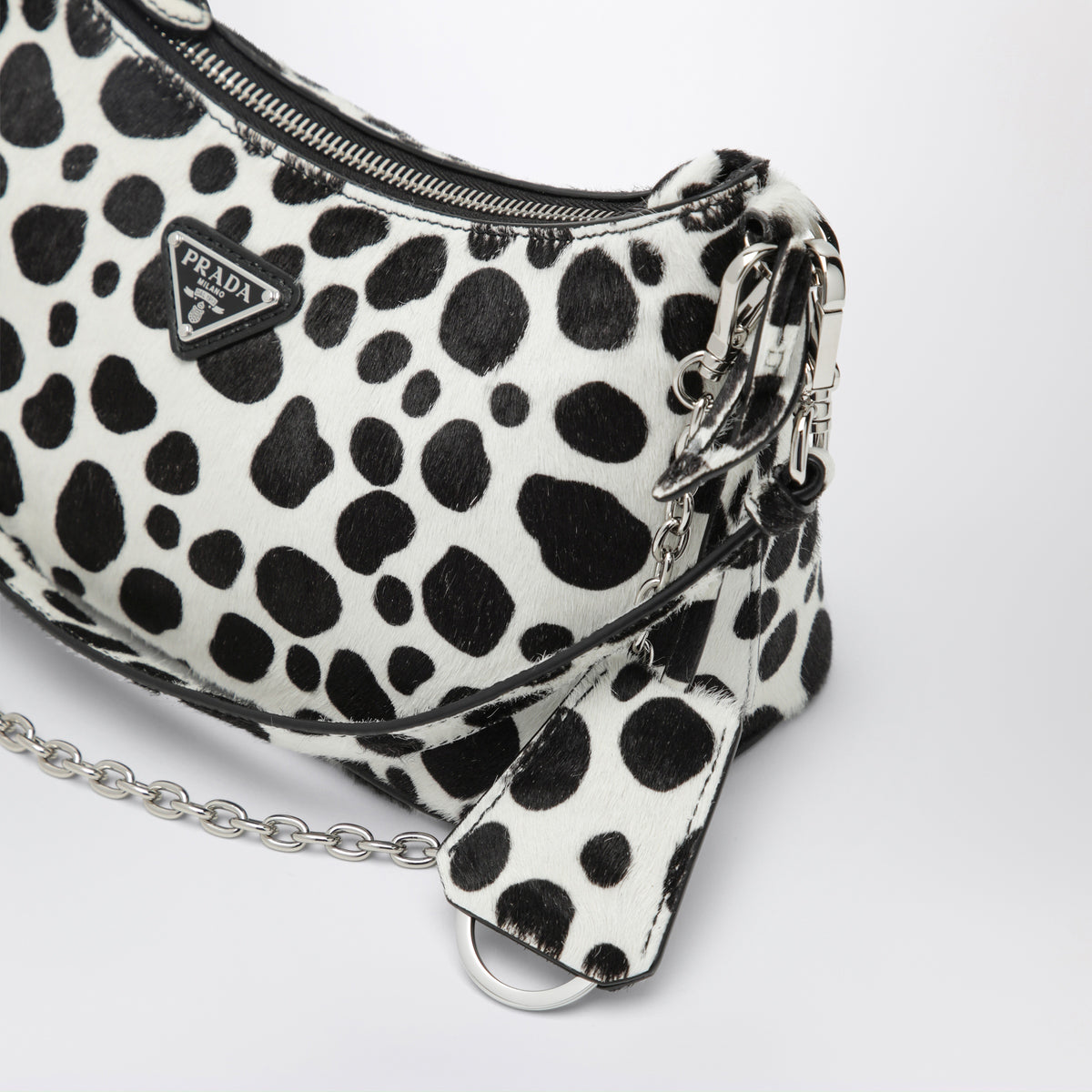 Mini borsa bianca e nera in cavallino stampato