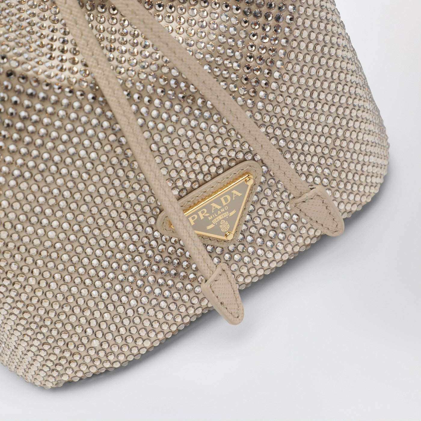 Sand-coloured bucket bag with crystals