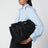 Borsa Baby Bag nera in Re-Nylon