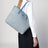 Light blue bag in printed Re-Nylon