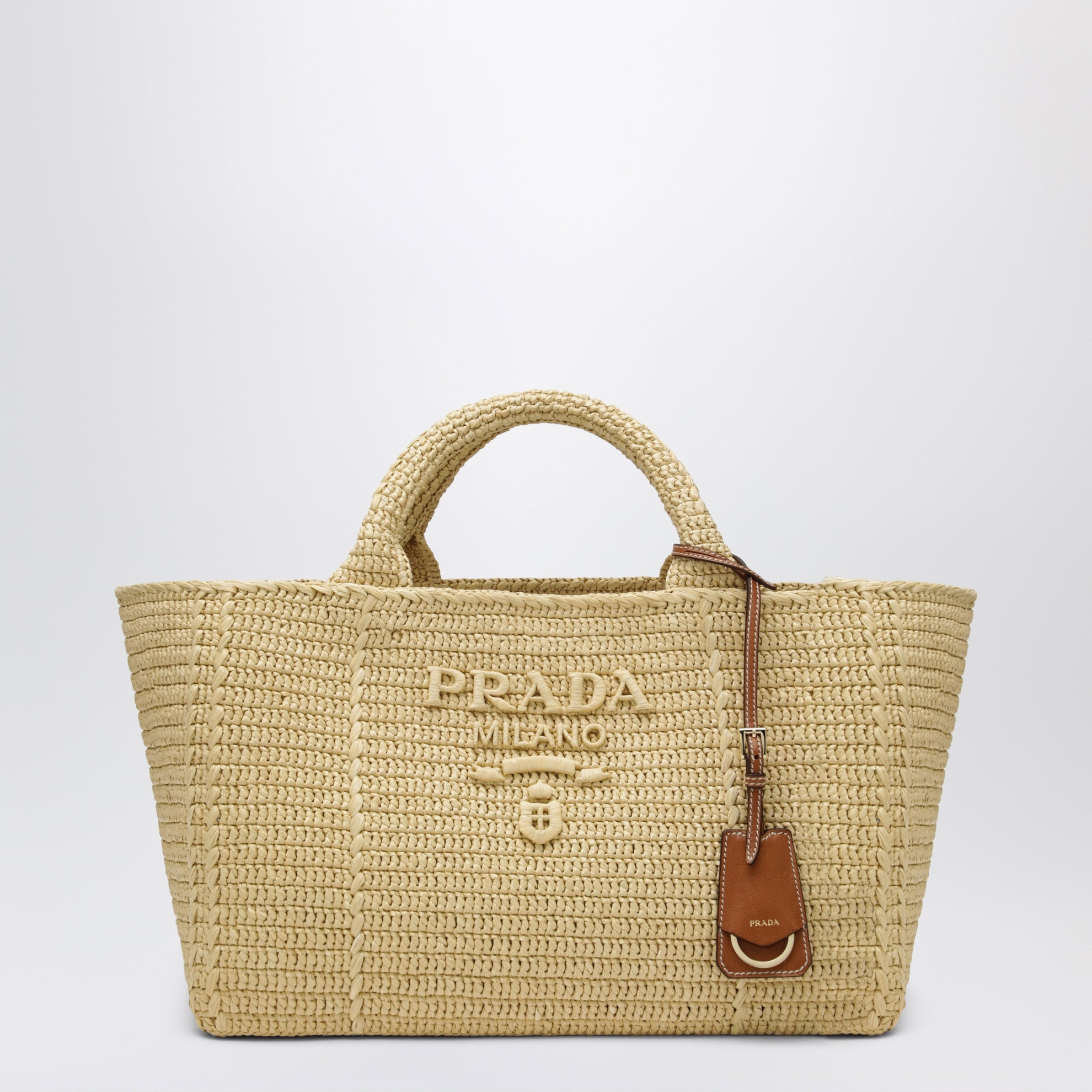 Große Shoppingtasche aus Häkelarbeit mit Lederdetails