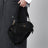 Borsa Prada Explore small in Re-Nylon e pelle nera