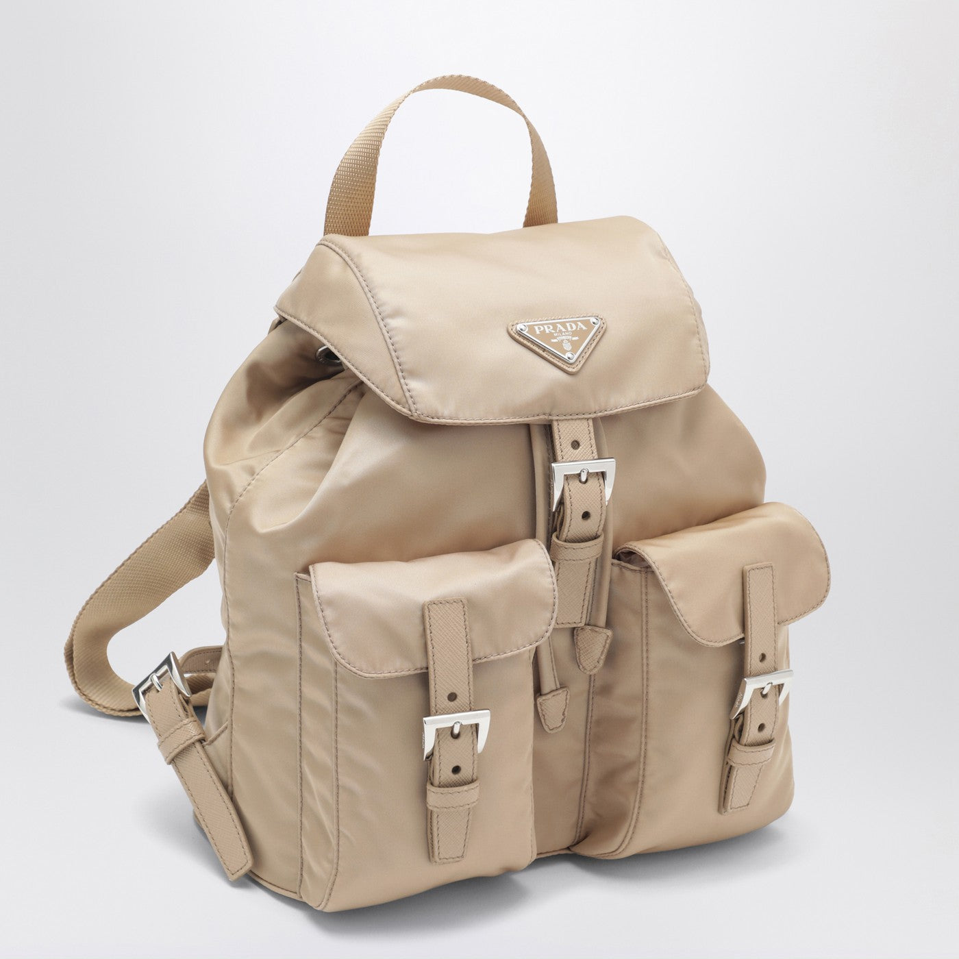 Small Re-Edition 1978 backpack in beige Re-Nylon